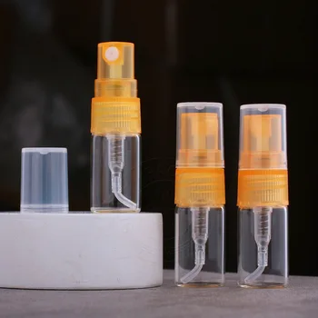1db 2 ml-es átlátszó üveg parfümös üveg narancssárga kupak mini spray-palack hordozható kozmetikai mintaadagoló palack üres palack