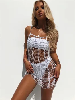 2021 Szexi ujjatlan üreges mini ruha Fényes divat spagetti pántos ruhák Nyári nők átlátnak a hát nélküli strandruházaton