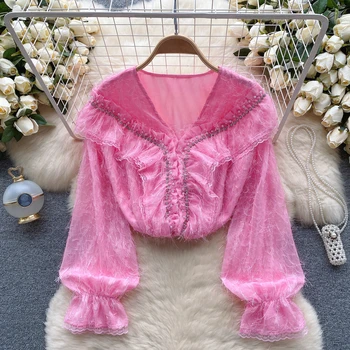 Clothland női stílusos tollgyöngyös blúz gyöngyfűző blúz gyöngy V nyak bojt fáklyás ujjú ing retro divat felsők Blusa LA973